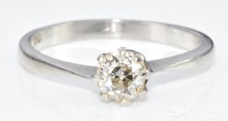 A platinum ring set with an old cut diamond of approximately 0.4ct, 3.4g, size M