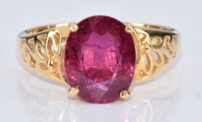 An 18k gold ring set with an oval cut ruby of approximately 2.9ct, with certificate, 4.3g, size N
