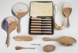 Hallmarked silver handled and backed items comprising set of butter knives, hand mirror, hand mirror
