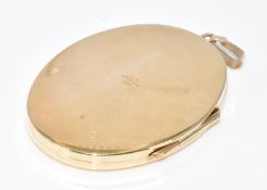 A 9ct gold locket, 13.5g, 5 x 3.2cm