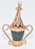 A 9ct gold charm in the form of a lamp set with bloodstone, 5.3g, 3.5cm