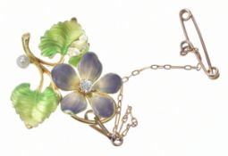 An 18k gold c1900 brooch/ pendant in the form of a flower set with a pearl, diamond and enamel, 5.