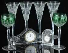 Two boxed Waterford Crystal clocks, four Millennium Collection wine /toasting glasses, two boxed,