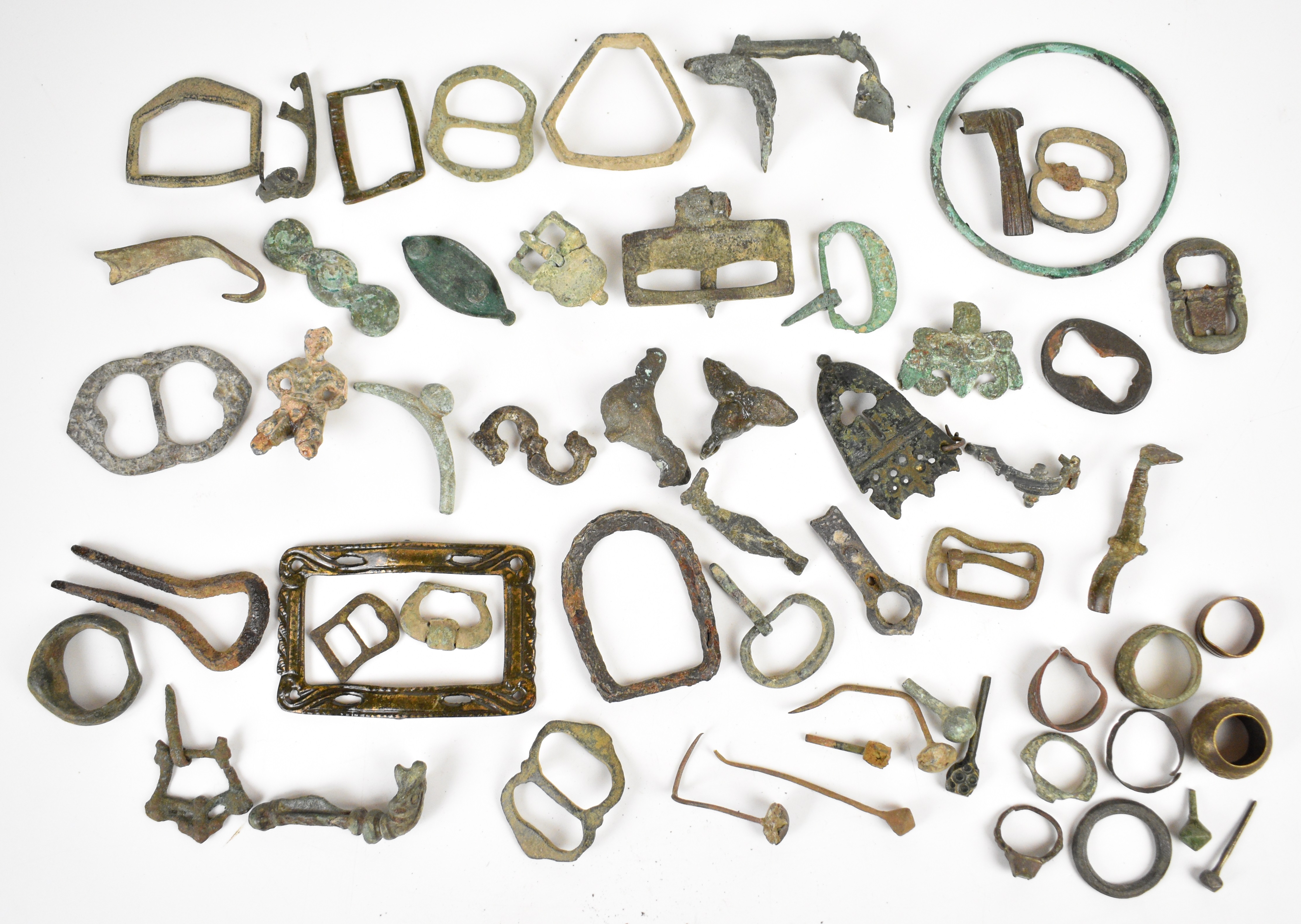 Metal detector finds, Roman onwards including buckles, figures, bangles, cloak pins, bronze and