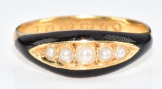 A 22ct gold ring set with black enamel and split pearls, Birmingham 1879, 3.6g, size R