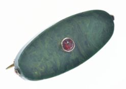 A 9ct gold brooch set with hardstone and a garnet by Murrle Bennett, in antique box, 3cm, 3.9g