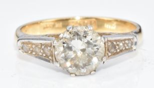 Art Deco 18ct gold ring set with a diamond of approximately 1.2ct, the shoulders encrusted with