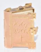 A 9ct gold charm / pendant in the form of the 'Holy Bible', 3.8g, 1.8cm