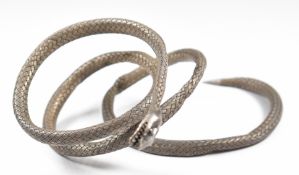 19th/20thC white metal serpent / snake bracelet made up of woven strands, tests as 900 grade, 26.4g