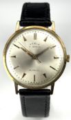 Shield 9ct gold gentleman's wristwatch with gold hands and arrow hour markers, silver dial and 21