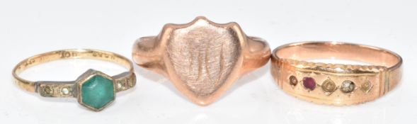 A 9ct rose gold signet ring (Birmingham 1917, 4.4g, size O), 15ct gold ring (missing all stones, 2g,