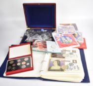 Six Royal Mint coin sets, 2005 coin pack, 1935 and 1937 crowns, collectable £2, £1 and 50p coins