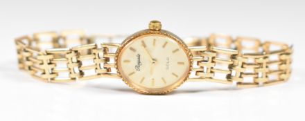 Royale 9ct gold ladies wristwatch with gold hands, baton hour markers and dial and quartz