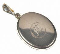 A c1900 15ct gold locket set with a split pearl to the pendant loop, 8g, 3.5cm