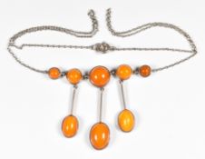 Arts & Crafts silver necklace set with amber cabochons, 5.1g, 40cm