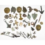 Roman, Viking, medieval and later metal detector finds including various cloak pins, buckles,
