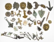 Roman, Viking, medieval and later metal detector finds including various cloak pins, buckles,