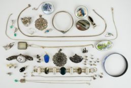 A collection of silver jewellery including three brooches set with enamel depicting a kingfisher,