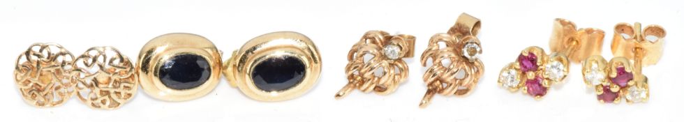 A pair of 18ct gold earrings set with diamonds and rubies (1.4g) and three pairs of 9ct gold