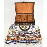 A collection of jewellery including 14k gold charm (1.1g), Peruvian silver pendant set with an