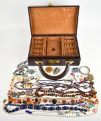 A collection of jewellery including 14k gold charm (1.1g), Peruvian silver pendant set with an