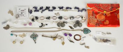 A collection of silver jewellery including ten pairs of earrings including pearl, quartz, emerald,