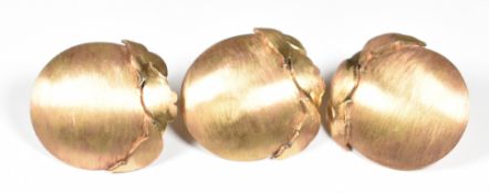 Three 9ct gold buttons with matte finish, 21.3g