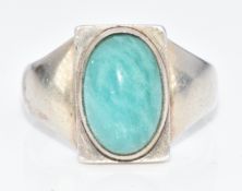 George Jensen silver ring set with a turquoise cabochon, 84B, 7.6g, size N