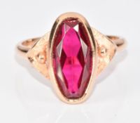 A 333 gold ring set with an oval synthetic ruby, 5.1g, size O