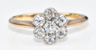 A c1910 18ct gold ring set with a cluster of old cut diamonds, 2.5g, size N