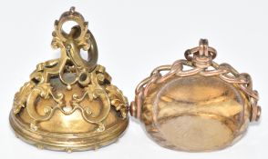 Victorian intaglio seal set with carnelian agate depicting a crest, and a 9ct rose gold fob set with
