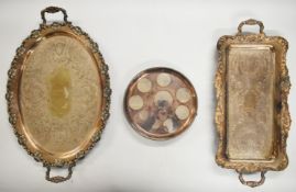 Three silver plated trays including two ornate twin handled examples, largest 72cm