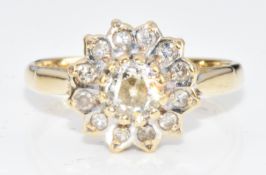 An 18ct gold ring set with a round brilliant cut diamond of approximately 0.3ct surrounded by