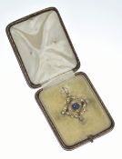 Edwardian 15ct gold pendant / brooch set with a sapphire cabochon, split pearls and old cut