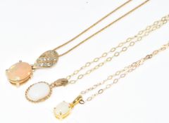 A 9k gold pendant set with an oval cut opal and Alexandrite, on 9ct gold chain, with certificate (