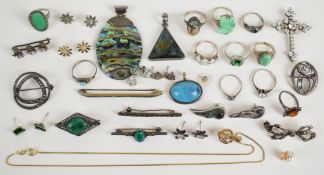 A collection of silver jewellery including eleven rings set with moss agate, green agate, pressed