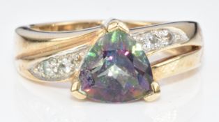 A 9ct gold ring set with a trillion cut mystic topaz, 5.2g, size N