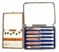 Cased set of six Elizabeth II hallmarked silver coffee bean spoons, Sheffield 1952, maker Cooper