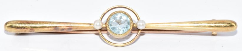 A 15ct gold brooch set with paste and pearls, 1.9g, 4.7cm