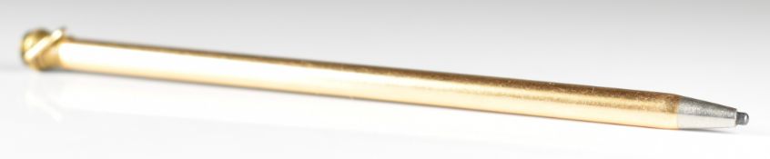 A yellow metal pencil, 3.6g. Tests as 9k gold