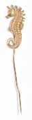 A 9ct gold stick pin in the form of a seahorse, 4.5g, 6.5cm