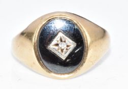 A 9ct gold signet ring set with hematite and diamonds, 3.2g, size N