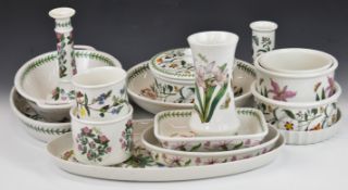 Approximately sixteen pieces of Portmeirion oven, table and decorative ware decorated in the Botanic