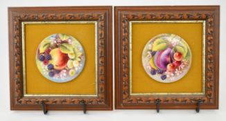 Two porcelain circular plaques decorated with painted fruit, signed by ex Royal Worcester artist T