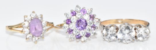 Three 9ct gold rings set with cubic zirconia, 7.5g, two size M, the other size O