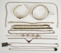 A collection of silver jewellery including bangle, section of Victorian chain, heart necklace,
