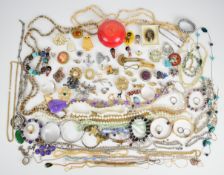 A collection of jewellery including Art Deco clip, vintage brooches, Miracle ship brooch, micro