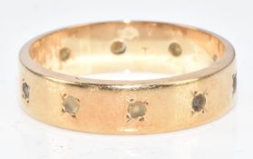 A 9ct gold ring (missing stones), 3.1g, size N