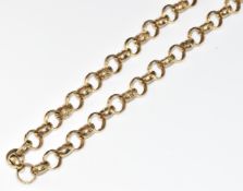 A 9ct gold necklace made up of circular links with scrolling decoration, 31.4g, 64cm