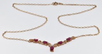 A 9ct gold necklace set with oval cut rubies and diamonds, 4.7g, 45cm